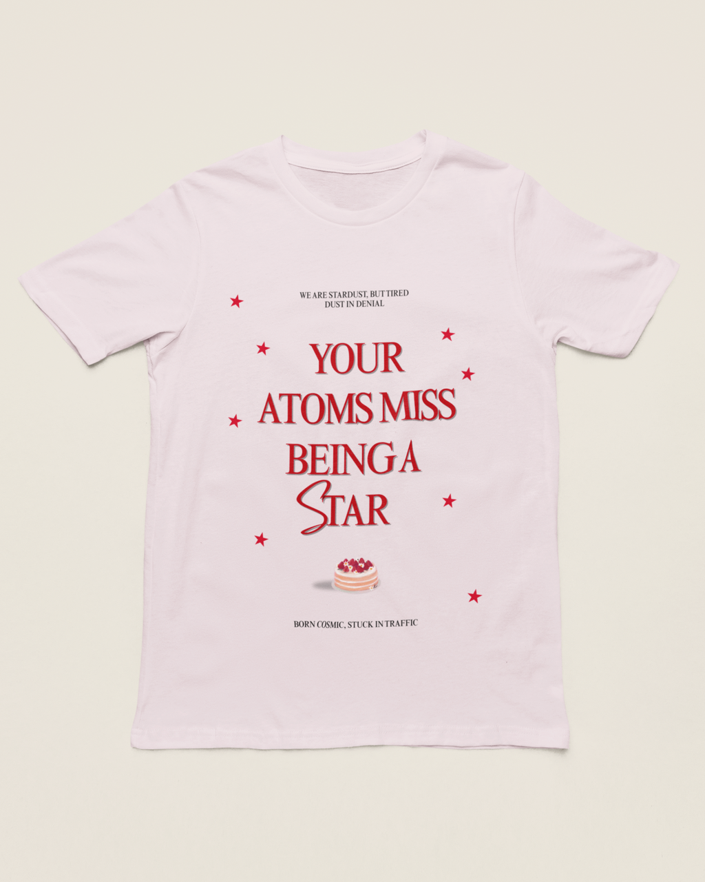 White t-shirt with red text and a small graphic on a light green background