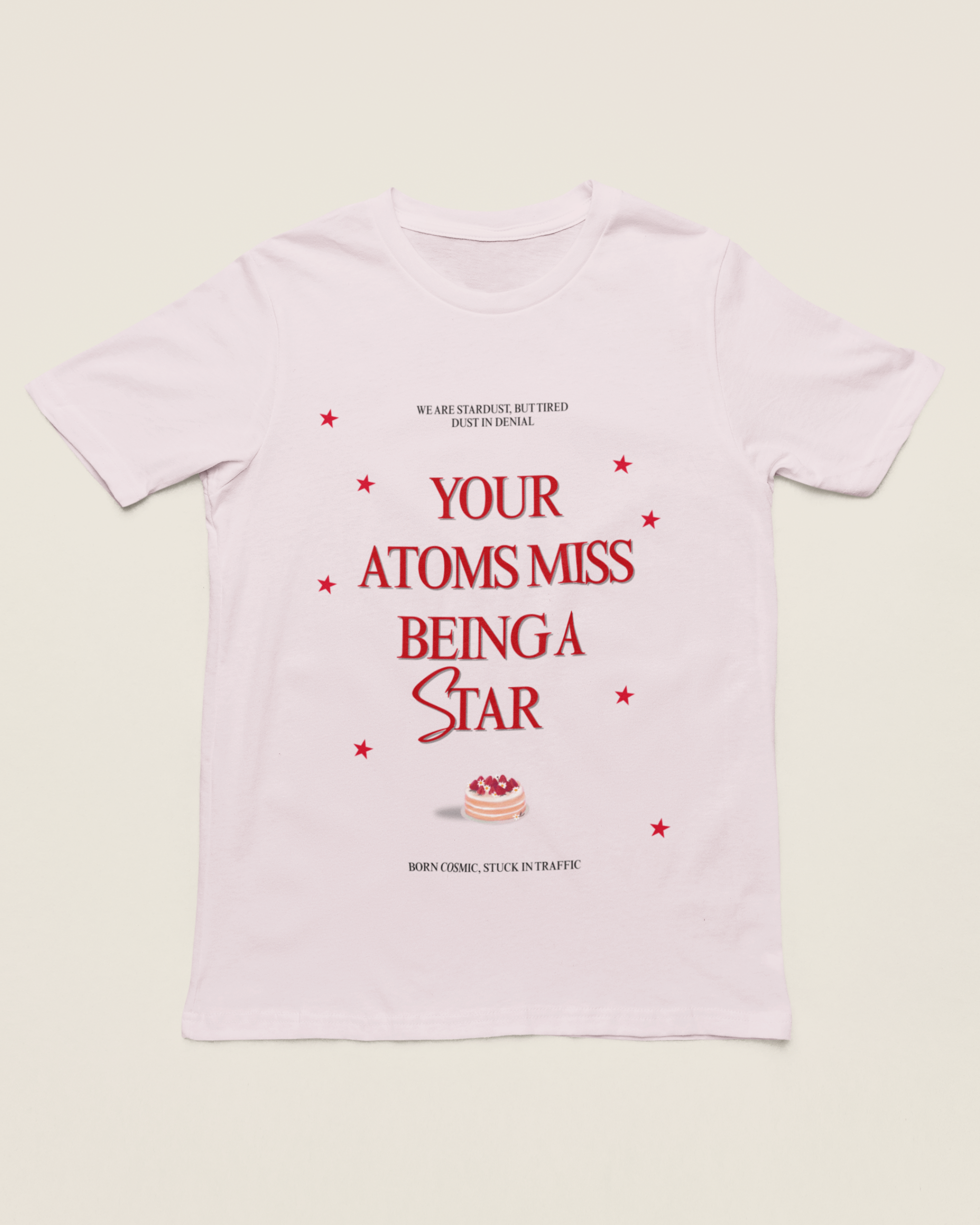 White t-shirt with red text and a small graphic on a light green background